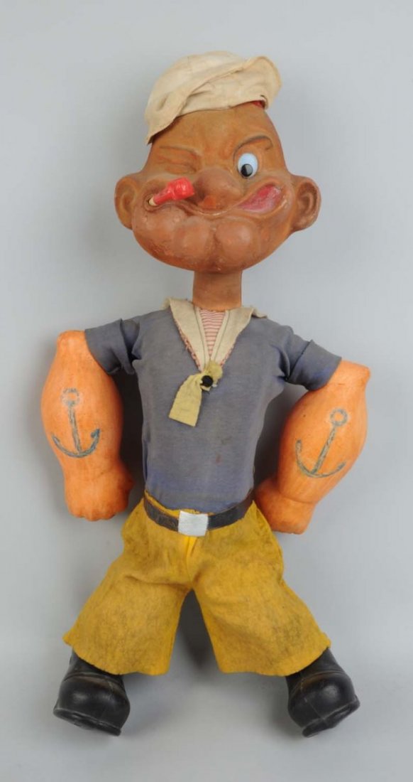 Post-War Folk Art Type Popeye Figure.: Looks to be original clothing and hat. Pipe is a replacement. Made of plastic. Marked "KFS" on the foot. Probably European. Very unusual. Does have some peeling around face area. Condition (Very Good)