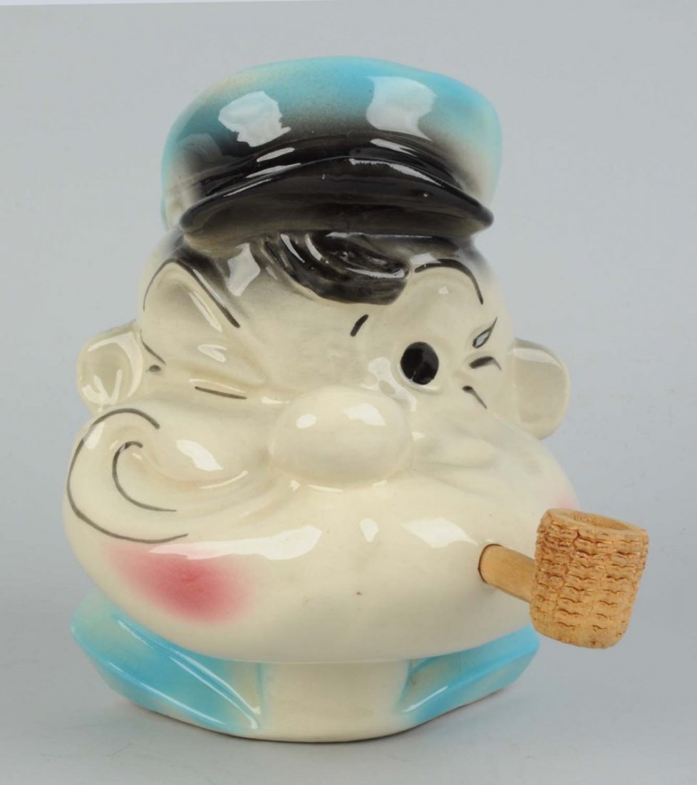 Ceramic Popeye Bank.: Portrait of Popeye with original corn cob pipe. Unmarked other than "USA" on the bottom. Very little wear. No chipping or cracks. Condition (Excellent). Size 7 - 1/2" T.