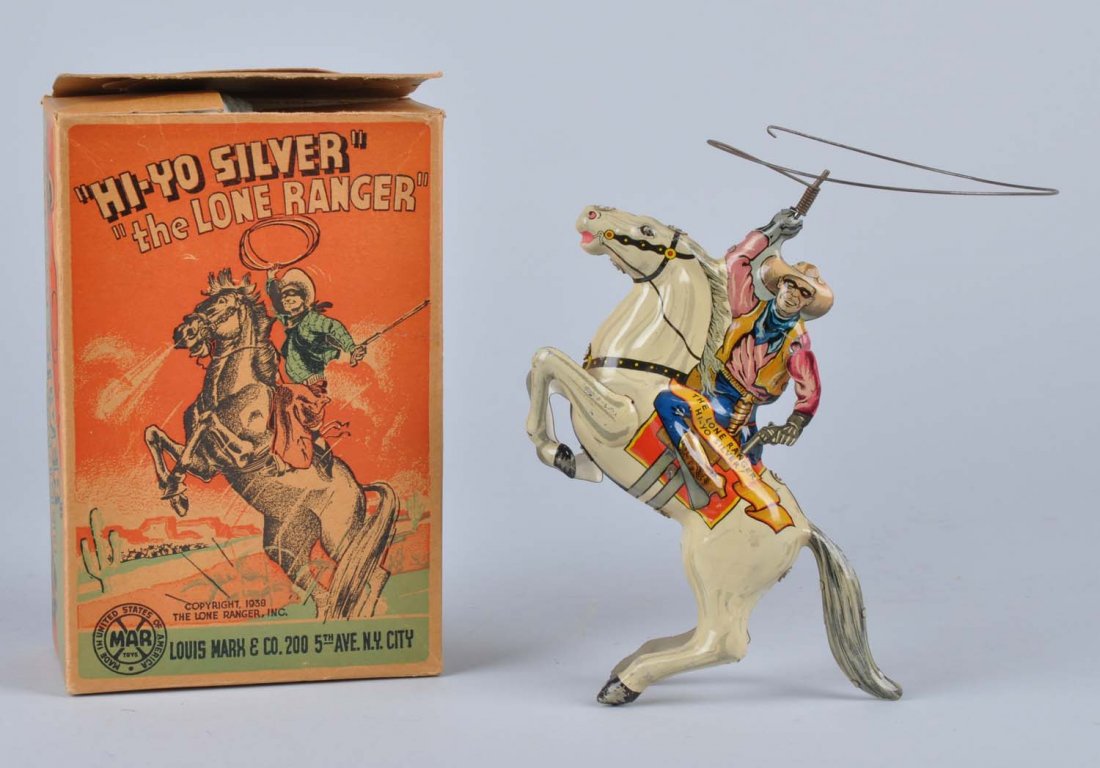 Marx Tin Litho Wind-Up Lone Ranger Toy.: Comes with a nice colorful original box with beautiful graphics. Marked "Hi-Yo Silver" and "The Lone Ranger". Original arm and lasso. Also marked "Copyright 1938 The Lone Ranger, Inc.". Some slight sc