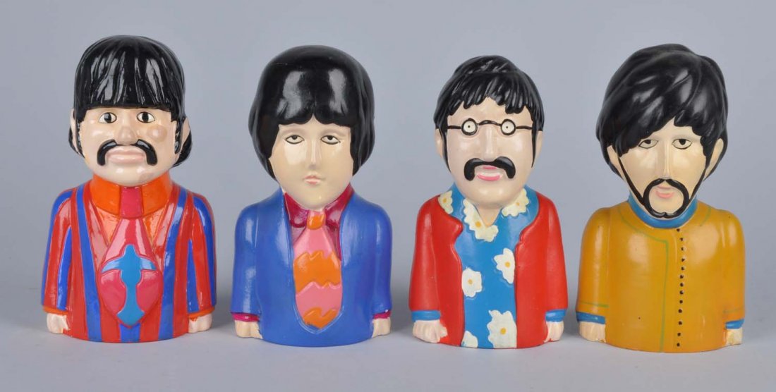 Lot Of 4: Rare Beatles Composition Banks.: Marked "1968 King Features-Suba Films Ltd.". Includes John, Paul, George, and Ringo. Made by Pride Creations. Painted composition figural banks. Two have the remaining "Pride" stickers and all four ha