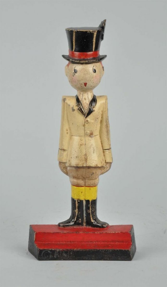 Cast iron Tiger Doorstop.: Stylized deco design doorstop with tan riding attire with top hat. Made by Hubley and marked, “© Fish, 269”. Anne Fish designer. Rare and Desirable. Condition (Excellent). Size 9 -1/2" T.