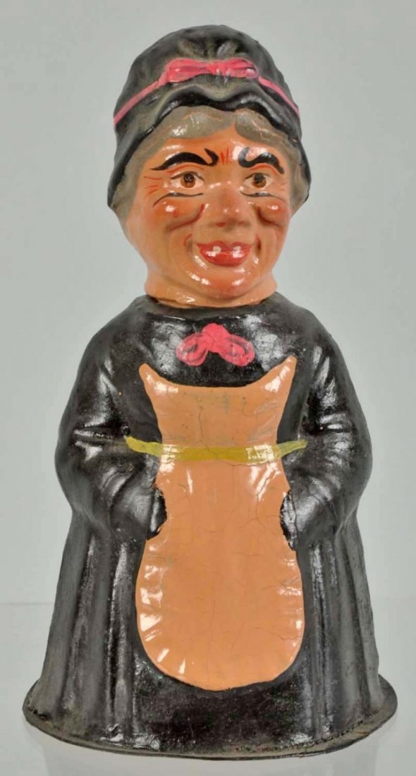 Cardboard Halloween Witch Candy Container.: Separation at neck. Touchup to paint on bonnet and dress. Condition (Very Good). Size 8" T.