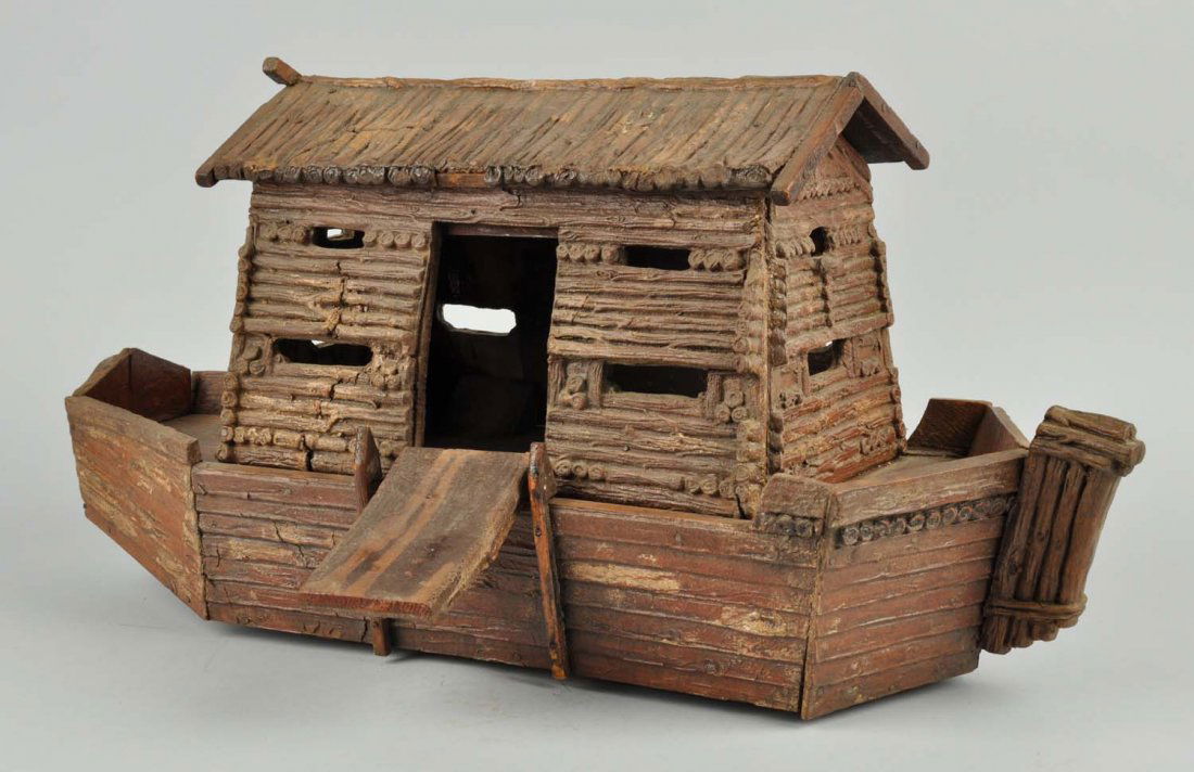 Wooden Log Style Ark With Figures.: This lot style ark has minor overall wear. Numerous figures that appear to be made of composition. Nice unusual ark and contents. Condition (Very Good Plus). Size 23" L.