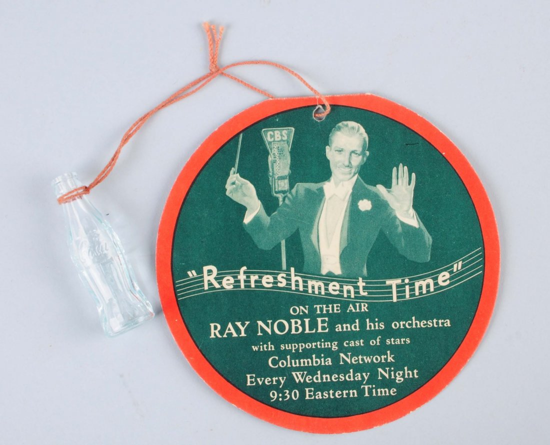 Late 30s Ray Noble Coca-Cola Advertising Piece.: Unusual four page fold out with its original string and coke bottle. Gives details and background on the refreshment time program which was sponsored by Coca-Cola. Condition (Near Mint). Size 5" Dia.