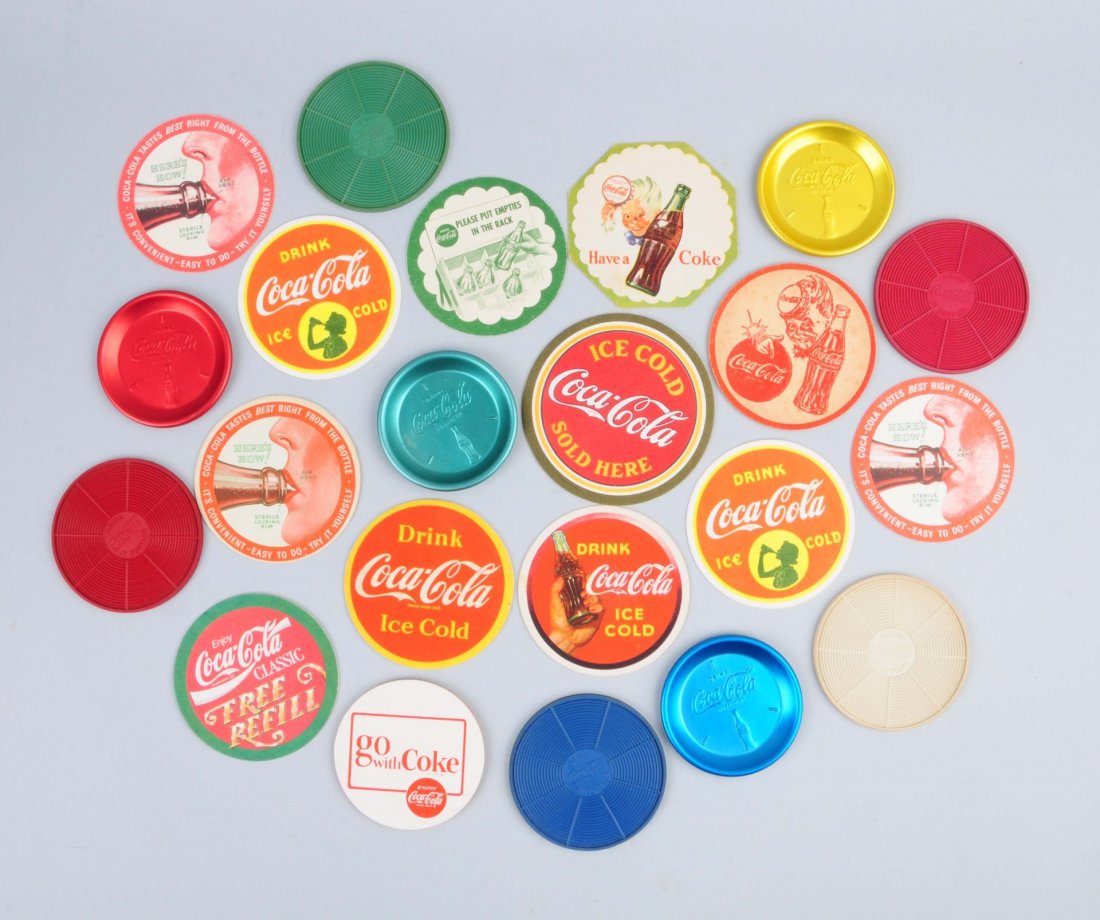 Lot Of 22: Coca -Cola Coasters.: Coasters are made of aluminum, rubber and paper. All with little to no wear. Condition (Near Mint). Size Largest : 4" Dia.