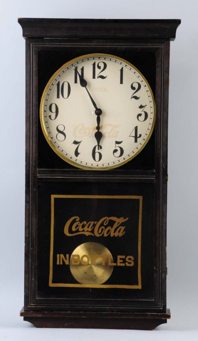Large Wooden Coca - Cola Clock.: Gilbert, with faded top logo. Appears all original. Condition (Very Good). Size 31' T.