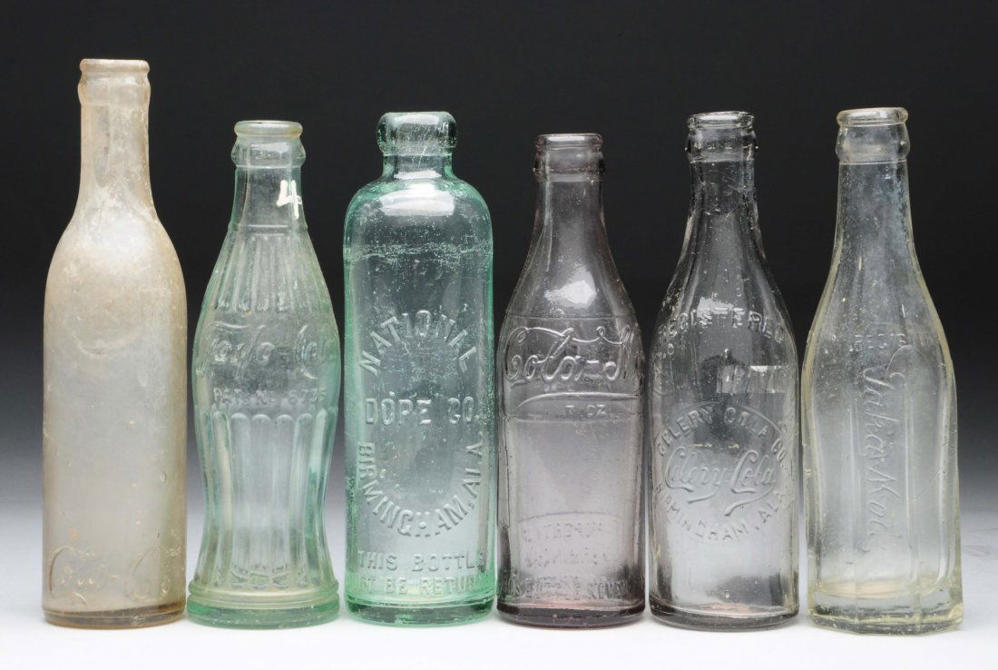 Lot Of 6: Assorted Glass Bottles.: A great lot of off brand soda bottles including, Cola Nip, national dope co, Taka Cola, Foslo Cola, Cola Co, and Celery Cola. All bottles have some scratching and nicks and mild to moderate residue. C