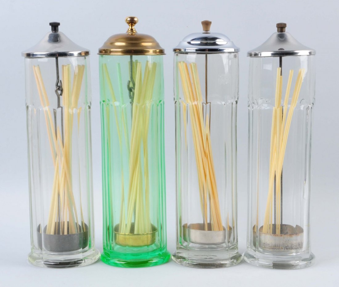Lot Of 4: Combination Glass Straw Holders.: These glass straw holders are taller than normal jars and are all in the colonial pattern. Little to no wear on all holders. Condition (Near Mint). Size 14" T.