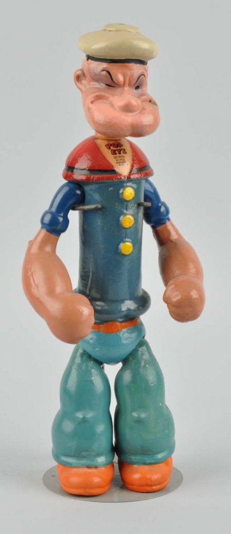 Popeye Figure.: Made of plaster, has some chips and cracks throughout. Missing his pipe. Marked " Popeye 1939 King Features Syndicate" on front. Condition (Good - Very Good). Size 14" T.