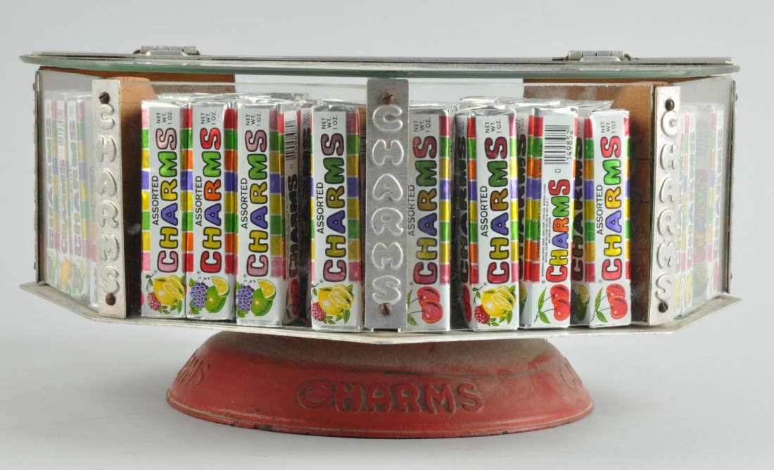 Charms Candy Rotating Display Case.: This glass rotating display is for charms candy. Minor wear and soiling to base. Condition (Very Good Plus). Size 6" T. x 12 - 1/2" L.