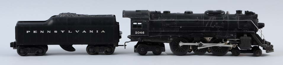 Lionel 027 Gauge Post-War 2046 Engine & Tender.: Includes 2046 steam type engine with matching 2046W-50 Pennsylvania scoop tender. Engine and Tender have been run and show moderate wear. Condition (Very Good).