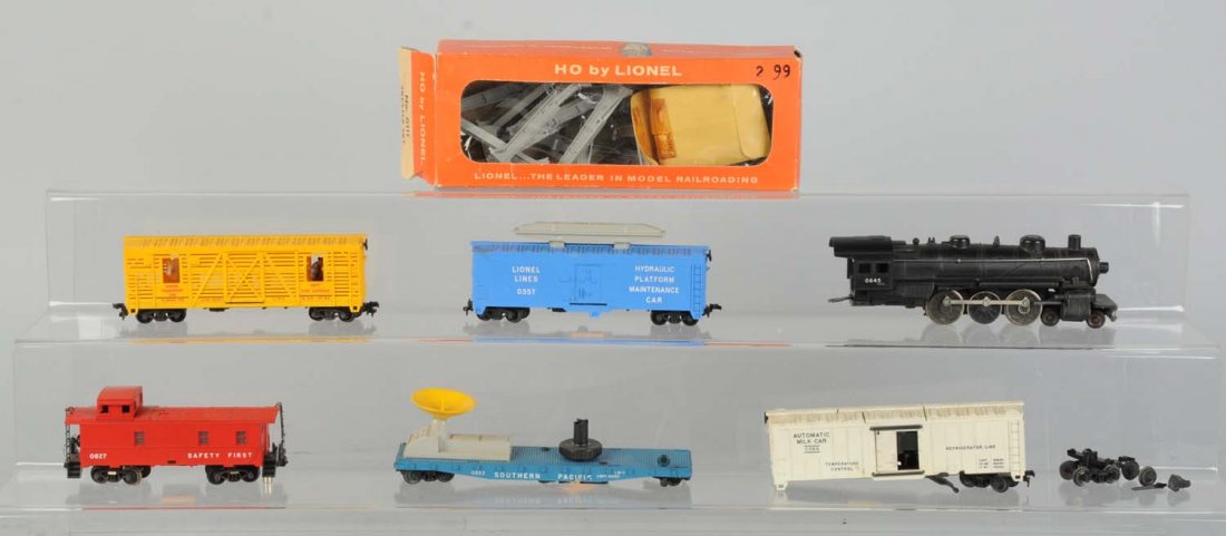 Lot of 7: Assorted Lionel HO Trains.: Lot includes: incomplete trestle set in original box, 0645 steam locomotive, no tender, loose boiler, missing rear truck.0873 horse car, complete and all original, very clean and attractive. 03537 hyd