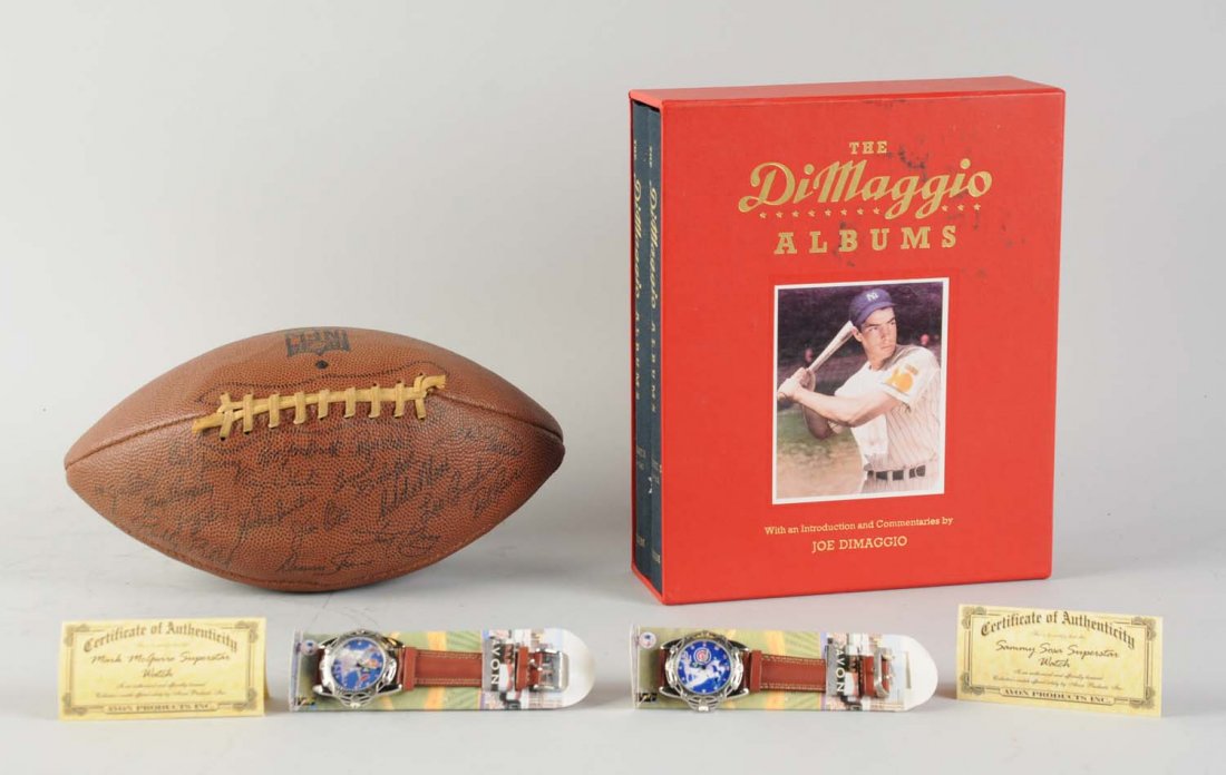 Misc. Lot Of Baseball Items & Comic Books.: Includes seven various comic books such as Tom & Jerry, Tarzan, and others. Also in the lot is baseball and football memorabilia including St. Louis Cardinals football with signatures, a pair of cleat