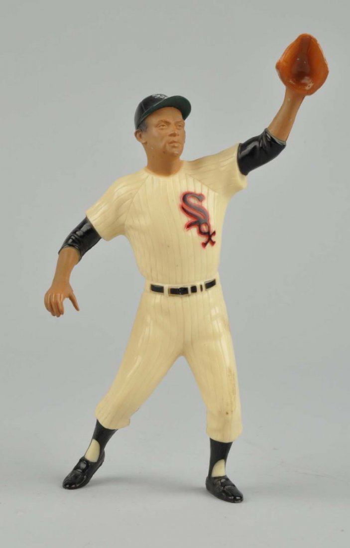 Hartland Plastic Nellie Fox Baseball Figure.: Nellie is in his No. 11 Chicago White Sox uniform in catching motion. Minor nicking to face, slight yellowing to figure, some wear to left leg. Condition (Very Good). Size 8" T.