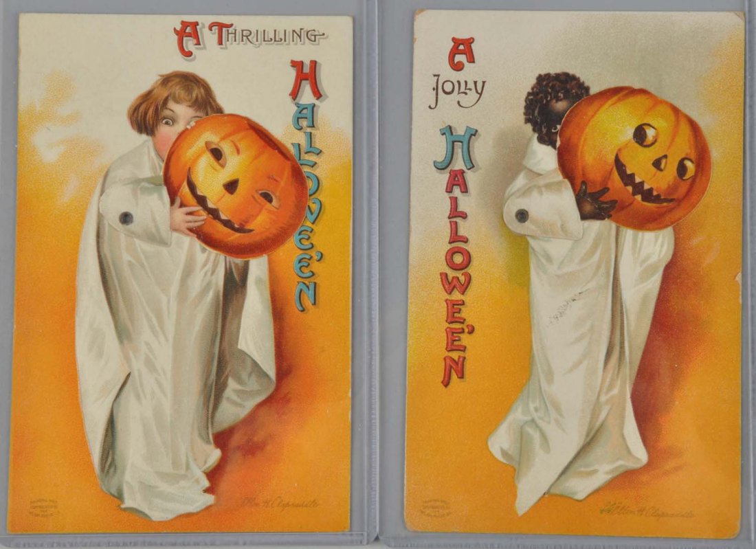 Lot Of 2: Clapsaddle Mechanic Halloween Postcards: The card depi8cting the white child has only minor corner bumping. The card depicting the black child has heavier corner bumping. Condition (Very Good). Size Each : 6" x 4 -3/8".