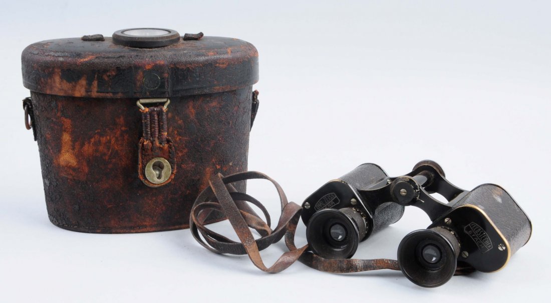 Zeiss Binoculars In Leather Case.: This pair of Ziess binoculars has overall moderate wear. The case has heavier wear and a compass mounted on the lid. Condition (Very Good). Size 5 - 1/2" T. x 7" W.