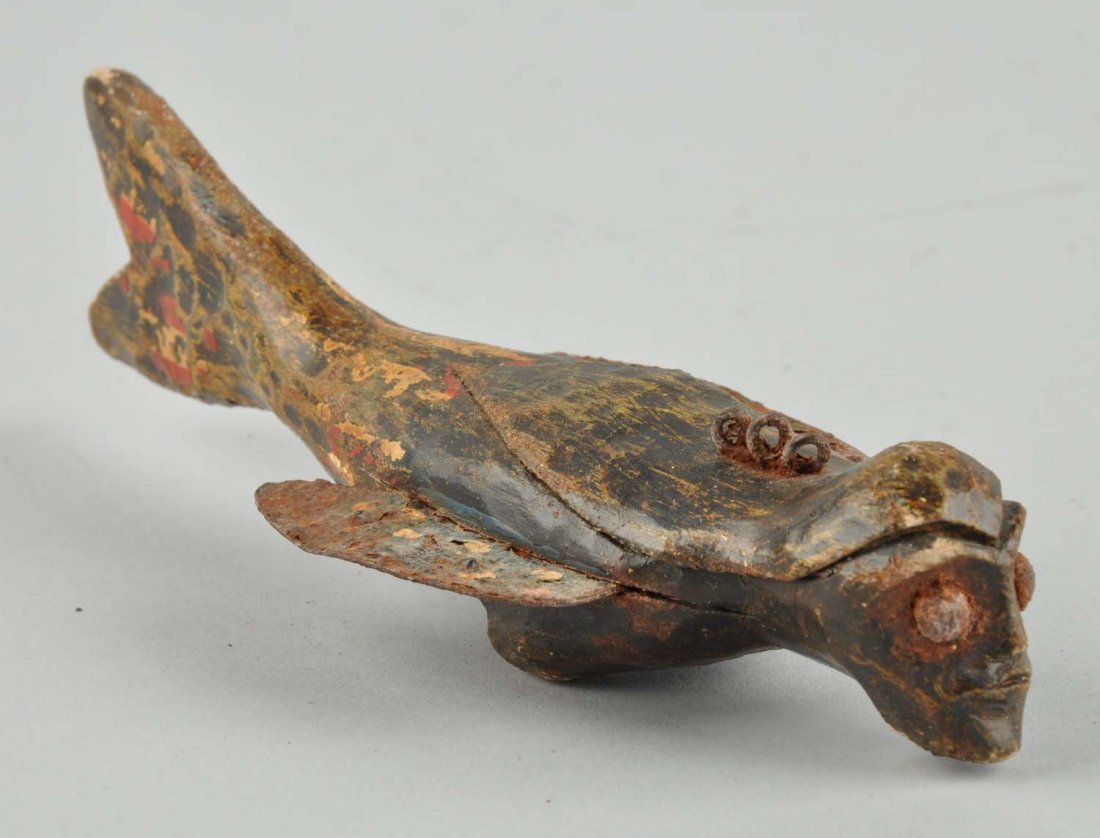 Carved Wooden Fish Decoy With Man's Face.: this early carved wood dish decoy appears to have a human face. Very unusual folk art item. Condition (Very Good Plus). Size 6" L.