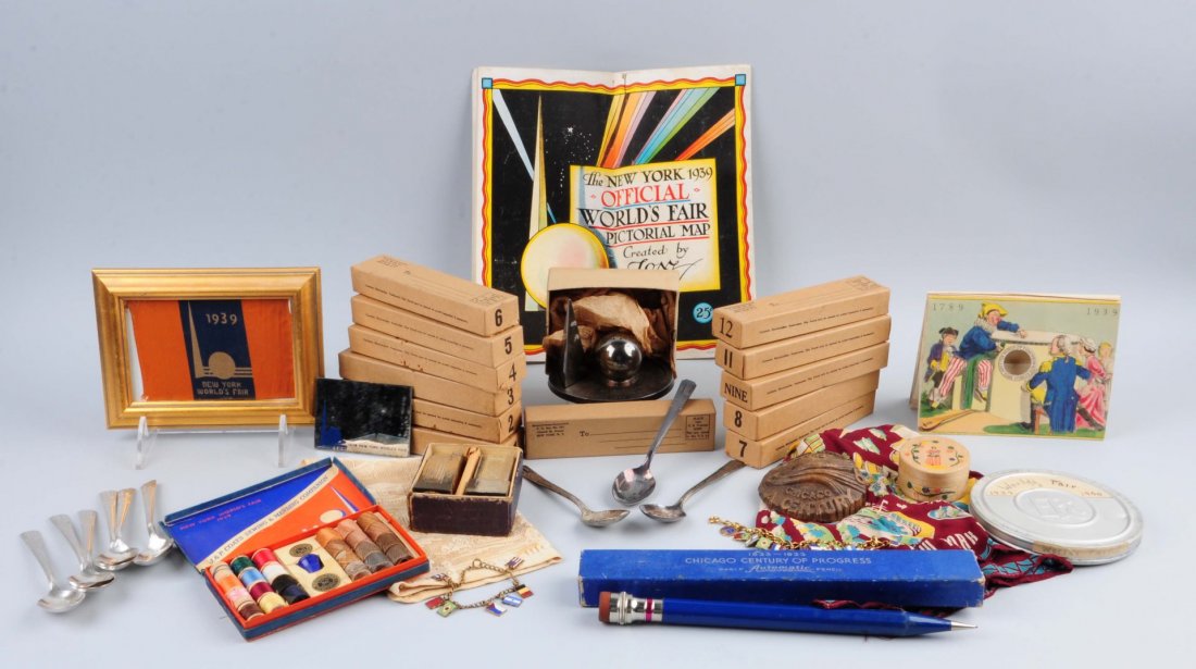 Lot Of 1933 And 1939 Worlds Fair Items.: This lot includes a sewing kit, a pictorial map, salt and pepper set and other items from the 1939 N.Y World's Fair. Also included are numerous commemorative spoons, a large pencil and other items fro