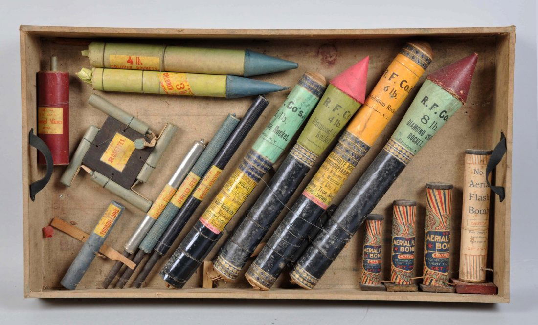 1890s Rochester Fireworks Co. Salesmans Display.: Super rare full sized. 16 pieces including massive rockets to eight pounds, Roman Candles, Aerial bombs, unusual Rosetta, Tourbillion and Mine. All in full size, not halved. Board size is 36 W x 21 H