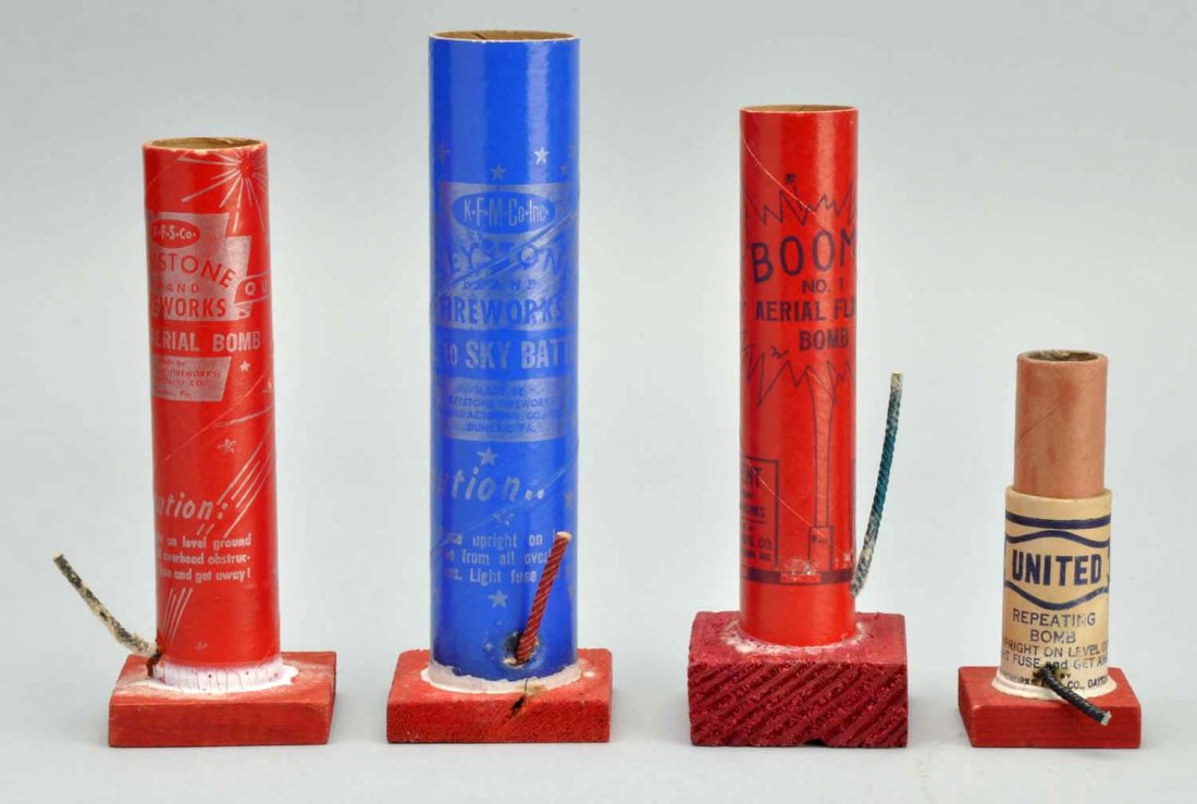 Lot Of 4: 1940s Aerial Bombs.: Includes: Keystone, Dunbar, PA No 1 Aerial. Keystone No. 10 Sky Battle. Kent Mfg, Chestertown, MD Boom No. 1 Aerial Flash Bomb. United Repeating Bomb. Condition (Near Mint). Size Largest: 6" T.