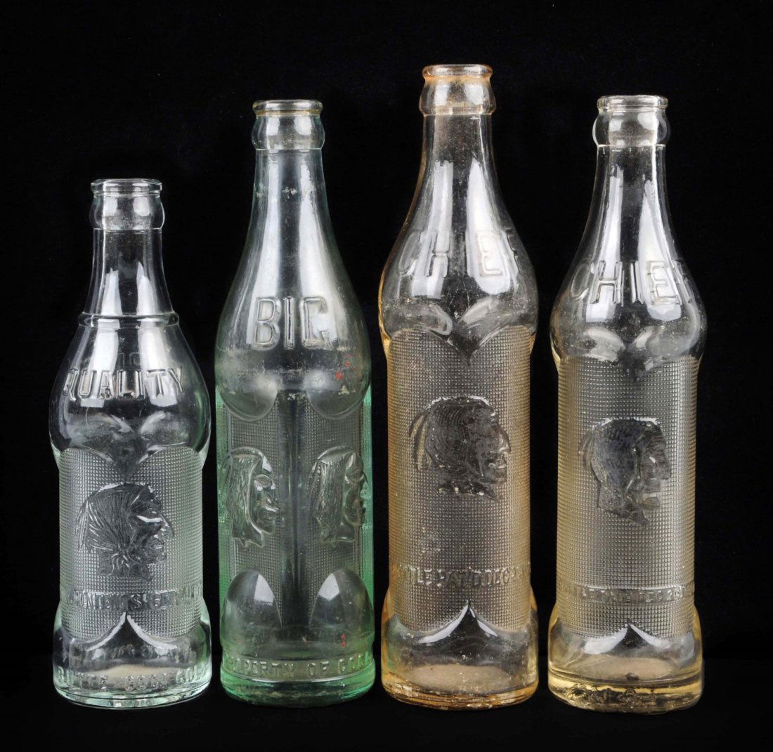 Lot Of 4: Big Chief Embossed Soda Bottles. (1 of 1)