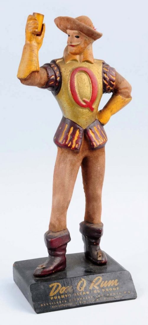 Don Q Rum Advertising Figure.: This figure is in nice condition but does have overall soiling. Some loss to lettering on base. Condition (Very Good). Size 14 -1/2" T.