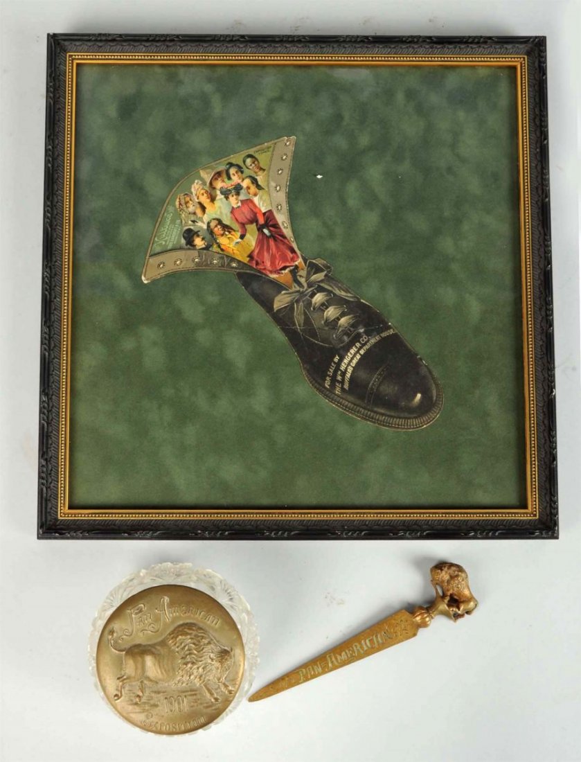 Lot Of 3: 1901 Pan American Expo Items.: This lot includes a brass medallion, brass letter opener with figural buffalo, and a diecut advertisement for Wm. Hengerer Department Store in Buffalo, New York. Condition (Very Good - Excellent). Siz