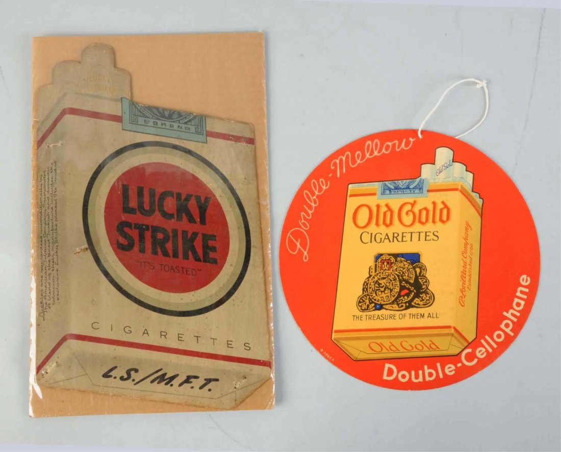 Lot Of 2: Cigarette Advertisements Signs.: This lot includes a small cardboard Lucky Strike sign with moderate overall wear and a cardboard double sides hanging Old Gold sign with only very minor wear. Condition (Very Good Plus). Size Largest: