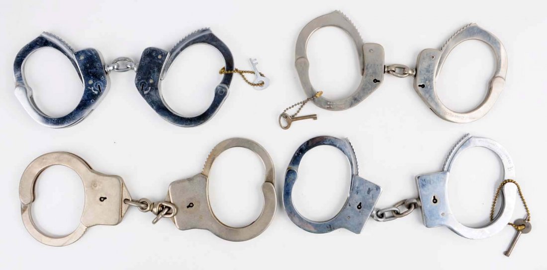 Lot Of 4: Handcuffs. (1 of 1)
