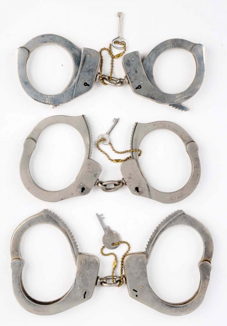 Lot Of 3: Handcuffs. (1 of 1)