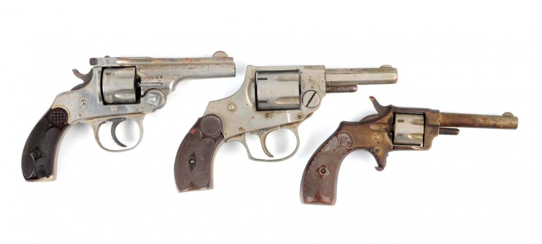 Lot Of 3: Antique Revolvers.: The first gun is a Russian Bulldog with nickel finish, metal brown patina. Not working. Second gun is a Blue Jacket spur trigger seven shot .22 caliber with nice dog head grips. Nickel finish mostly b