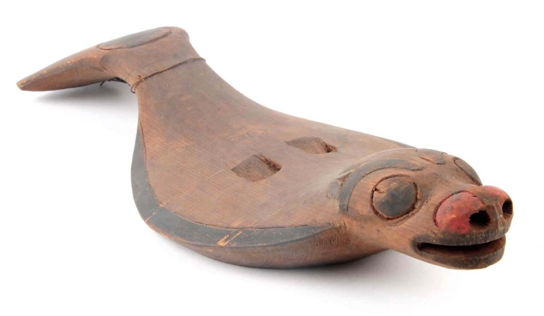 Alaskan Tlingit Wooden Carved Dog Fish.: This wooden dog fish was carved by the Tlingit Indians in Sitka, Alaska. Early to mid 20th Century. Paint is worn. Condition (Very Good). Size 12-1/2'' L.