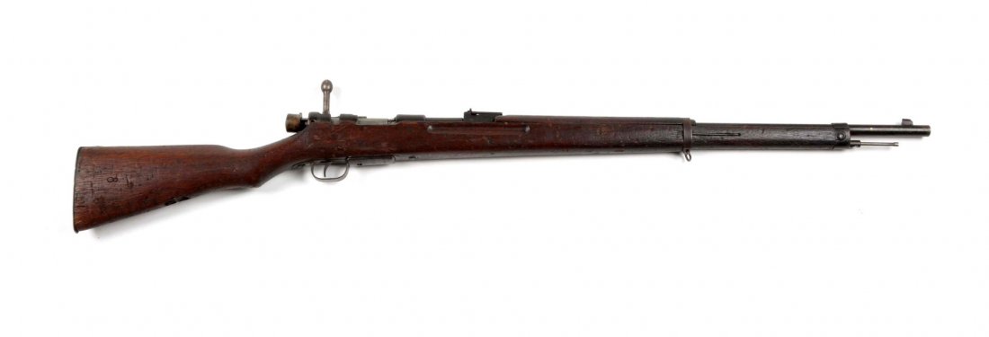 Japanese Arisaka Training Rifle.: Serial # 38823 This is an early training rifle that was used for school instruction prior to World War II. It seems to be a more accurate replica of the military rifles than many of the training rifle