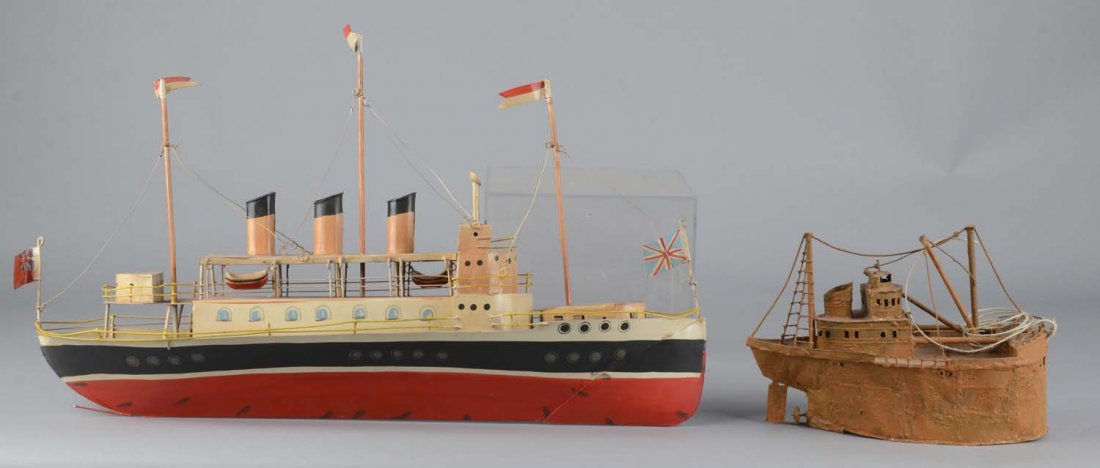 Lot Of 2: Handcrafted Metal Boat Sculptures: Including 1 - Orange copper color sunken ship figure with a hammered appearance throughout and 1 - handpainted boat with wonderful detailing both in metal structures and painted features. Condition (G