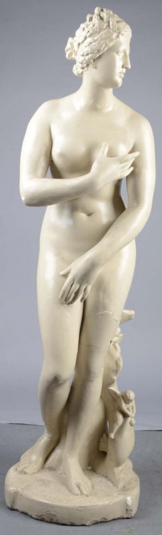 Figural Nude Woman Plaster Statue: This is a great piece for a fountain or poolside. Features cherubs riding a dolphin at the woman's feet. This statue does have stress cracks and some damage to the left thigh and right ankle, likely r
