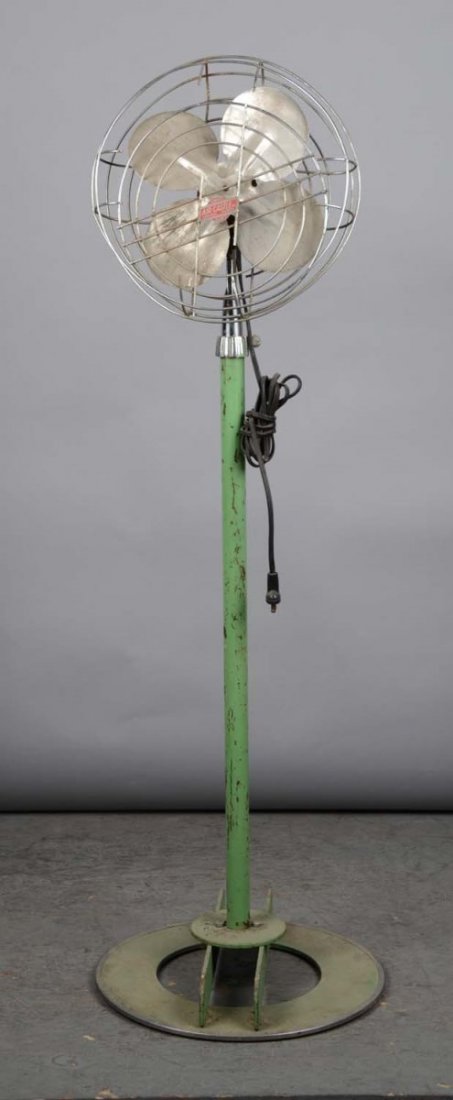 Vintage Air Castle Floor Model Electric Fan: This four blade fan on green art deco style stand is marked Universal Electric model 13M12. Condition (Good). Size 51" T.