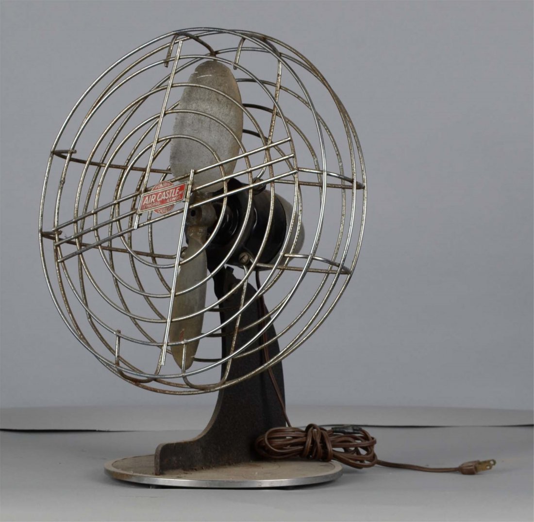 Vintage Air Castle Electric Desk Fan: Universal Electric Co. tabletop dual-blade Model 14H8. Fan blades show a few deep scratches and a chip at one end. Condition (Good). Size 17-1/2" T.