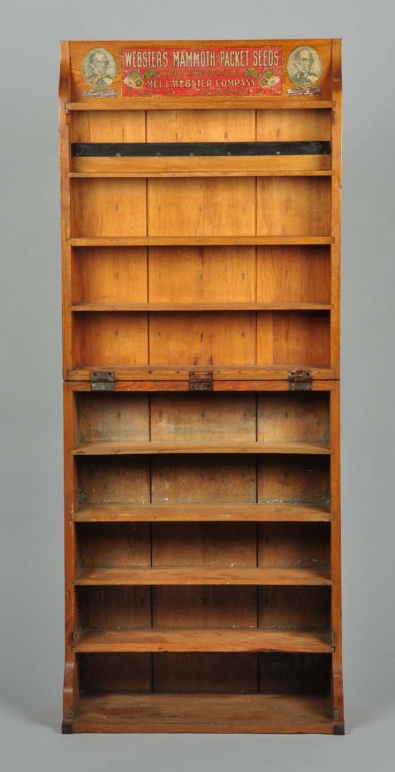 Wooden Daniel Webster's Fold-Up Seed Display.: Designed to display packets of seeds. Some mild wear to the wood and the label has moderate wear and loss. The display folds up and locks for salesman to travel with. Condition (Good). Size 57" x 23 -