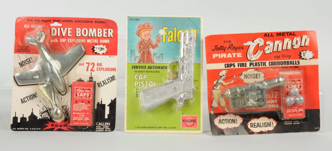 Lot of 3: Assorted Toys Sealed on Card.: This lot of three toys are all sealed on card. They are a Callen Dive Bomber cap toy, a Kilgore Falcon cap gun, and a Jolly Roger Cannon by MFG. Condition (Excellent). Size Largest : 8 -1/4" L.