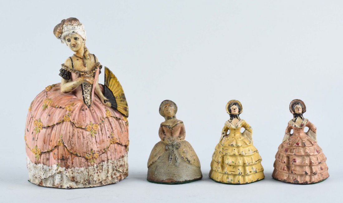 Cast Iron Asst. Women In Hooped Skirts Doorstops. (1 of 1)