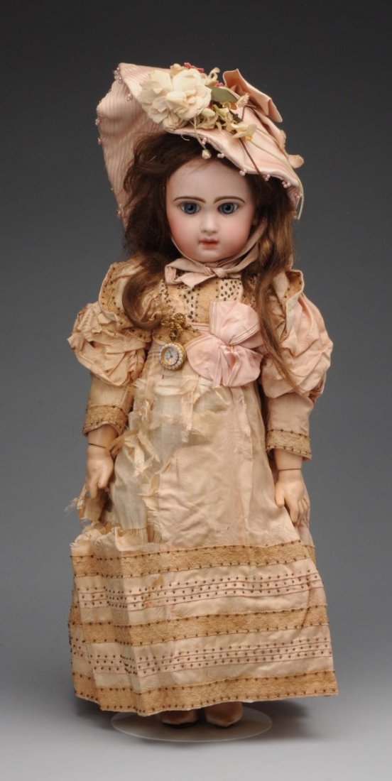 All Original Tete Jumeau #10.: Not often does one have the opportunity to purchase factory original Jumeau`s let alone a pair! This particular example is elaborately costumed in a gold colored bebe outfit, fabulous pale bisque, blu