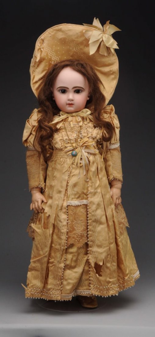 All Original Tete Jumeau #12.: The matching mate to item #15169000, this particular example is marked Tete Jumeau #12 on the rear of the bisque head. This example is fancifully costumed in a pink/rose colored outfit with a matching