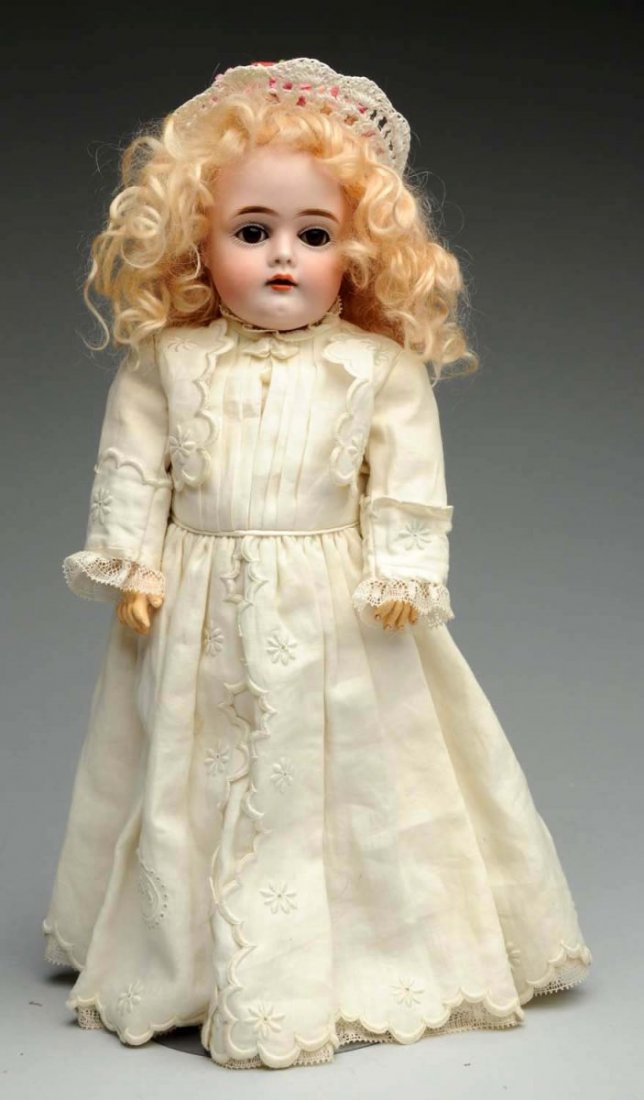 Classic Kestner Child Doll.: German bisque socket head incised “A made in Germany 5 161” by J.D. Kestner with multistroked eyebrows, sleeping eyes, painted lashes, open mouth with teeth, plaster pate, replaced mohair wig; ori