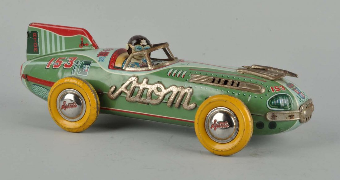 Japanese Tin Litho Friction Atom Race Car. (1 of 3)