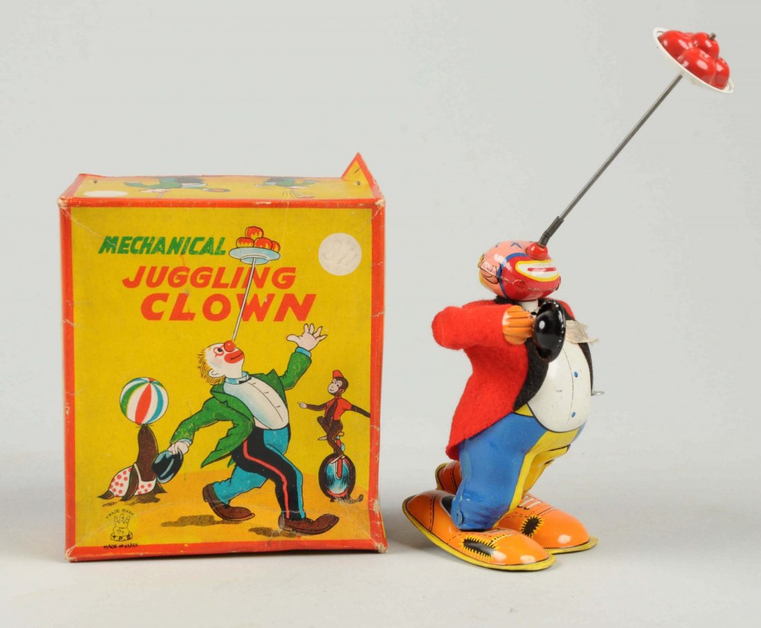 Japanese Tin Litho Wind-Up TPS Juggling Clown. (1 of 2)