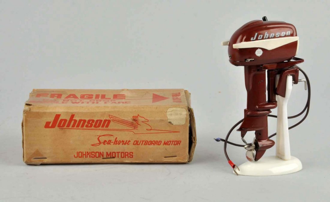 Japanese Johnson Outboard Toy Motor.: With original box. Includes original stand and instructions. Some staining and tape to box. Motor marked "Johnson 30". Some minor chipping and wear. Condition (Excellent). Size Box: 6 - 1/4" x 3 - 1/2