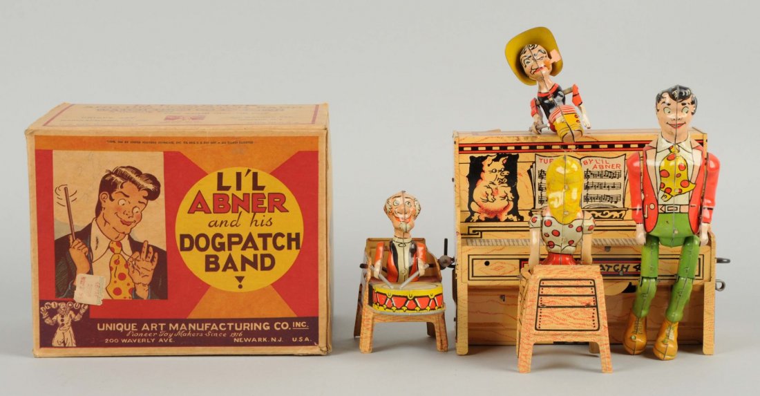 Unique Art Tin Litho Li'l Abner Dogpatch Band.: This wind-up toy includes its original box. Box is crisp and complete. Band is complete, but the left arm on Mammy Yocum is a replacement. Condition (Excellent). Size Box: 7-1/2'' x 6'' x 5-1/4''.