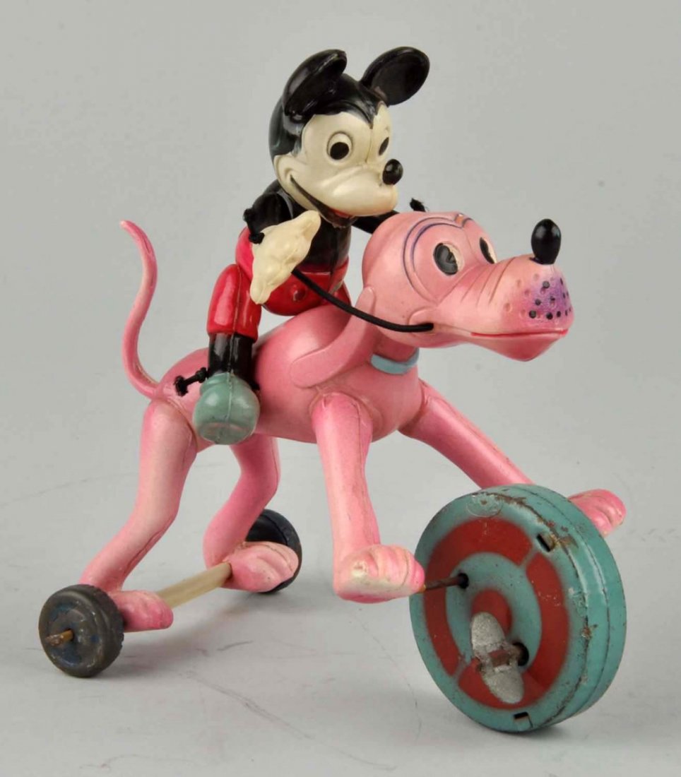 Disney Celluloid Wind-Up Mickey Riding Pluto Toy. (1 of 2)