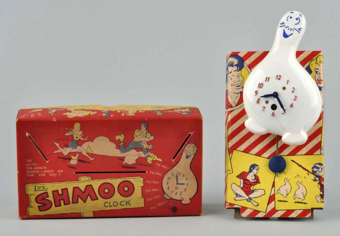Lux Shmoo Clock.: Includes original box marked "Al Capp". Has insert. Also includes other Dogpatch characters such as Daisy May and Li'l Abner. Looks to be unused. Circa 1950. Condition (Near Mint). Size Box : 8 -1/2"