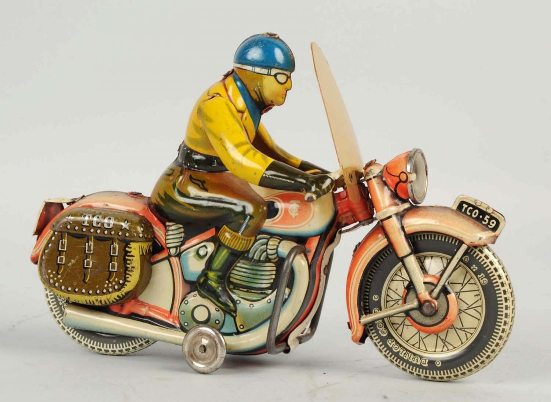 German Tippco Tin Litho Wind-Up Motorcycle Toy. (1 of 2)
